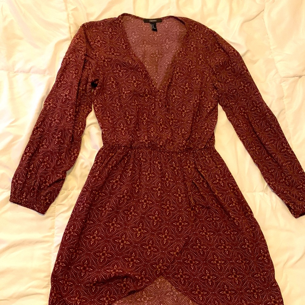 Floral dress, vintage style. Women’s M. Asymmetrical on the bottom.